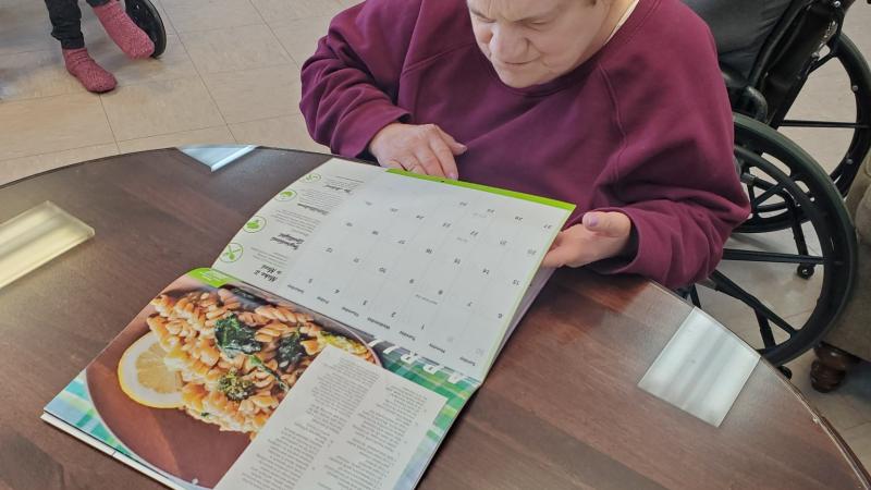 Lady looking at calendar